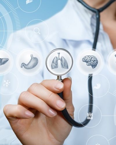 Doctor,Listens,To,The,Internal,Organs,On,A,Blue,Background.